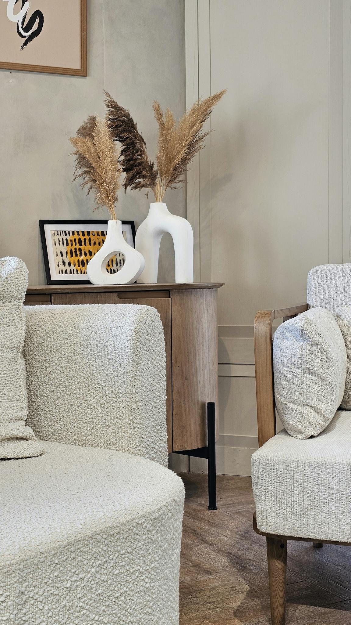 A stylish modern living room with minimalist furniture and decor accents.